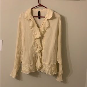 Beautiful ruffled cream blouse
